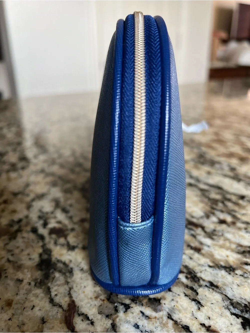 La Mer Metallic Blue Saffiano Faux Leather Cosmetic Bag
